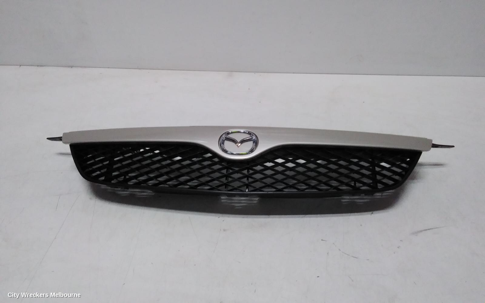 MAZDA 323 2000 Grille