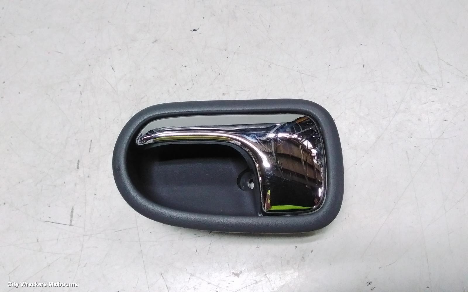 MAZDA 323 2000 Door Handle