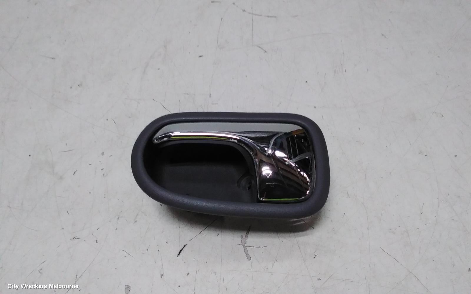 MAZDA 323 2000 Door Handle