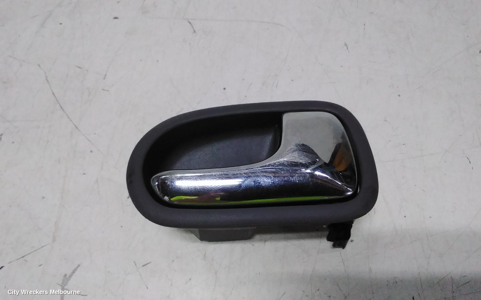 MAZDA 323 2000 Door Handle