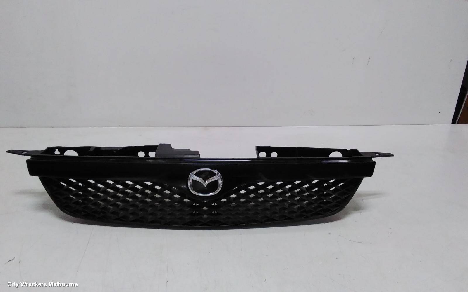 MAZDA 323 2000 Grille